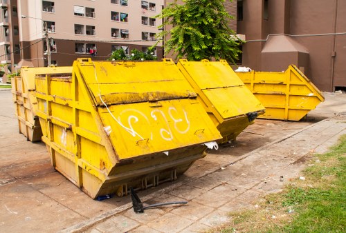 Exterior of a house ready for clearance with piled items